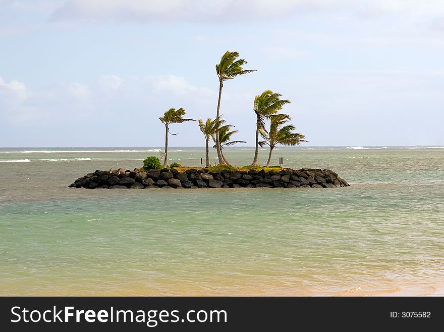 Little rock island sitting in the middle of the ocean. Little rock island sitting in the middle of the ocean