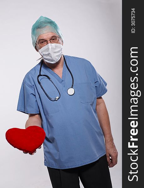 Medicine - surgeon with heart on hand