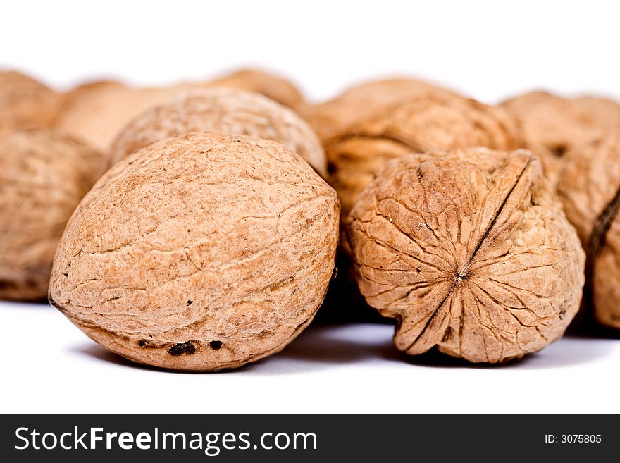 Walnuts close up isolated on white background