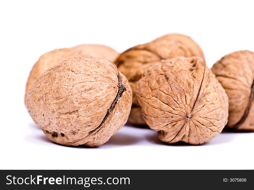 Walnuts close up isolated on white background