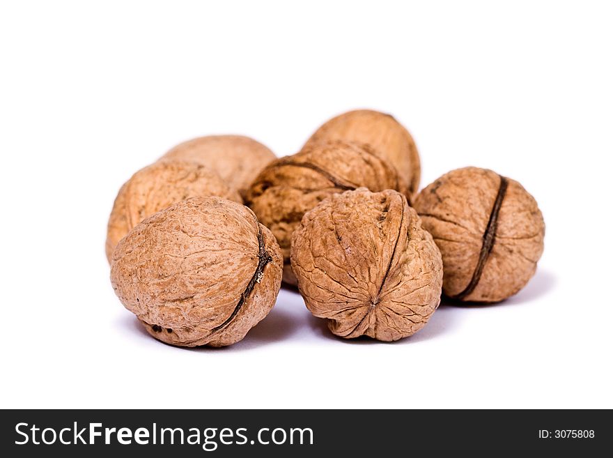 Walnuts close up isolated on white background