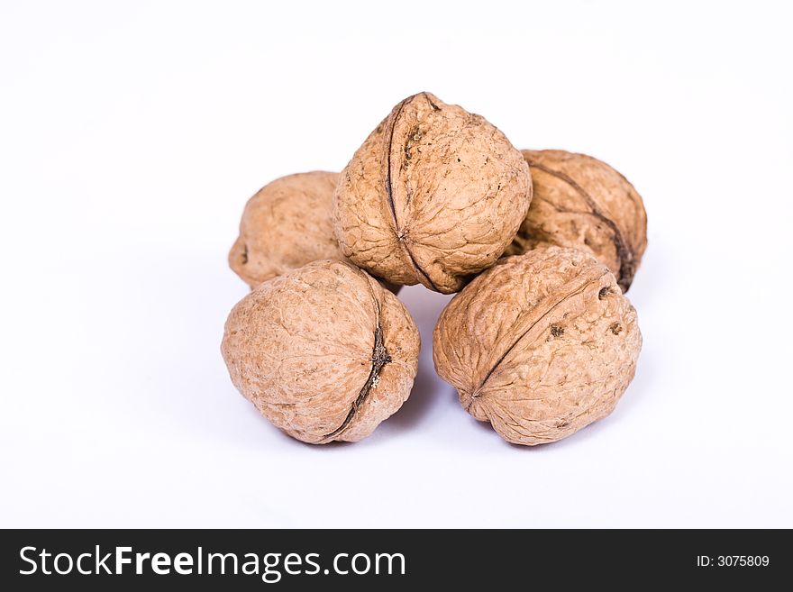 Walnuts close up isolated on white background