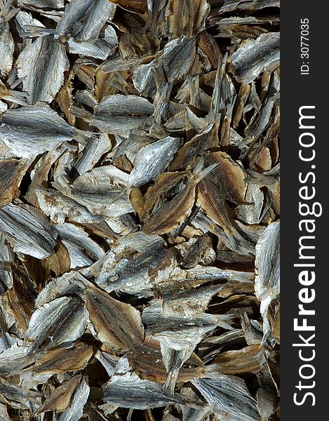 Lots of sliced dried salty fish or anchovies. Lots of sliced dried salty fish or anchovies