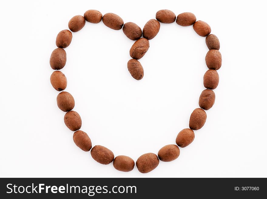 A Coffee heart isolated over white bachkroung