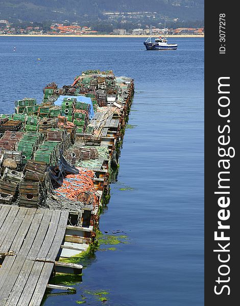 Old dock with nets of fishing in Galicia, Spain. Old dock with nets of fishing in Galicia, Spain