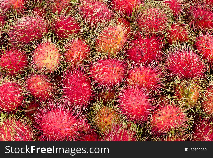 Red rambutan background and texture. Red rambutan background and texture