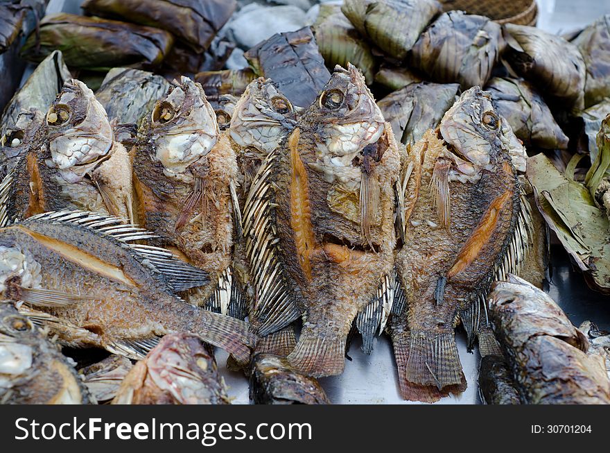 Fried tilapia fish in local market, Thailand
