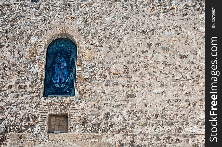 Stained glass window in a stone church in almeria