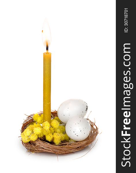 Easter composition with burning candle