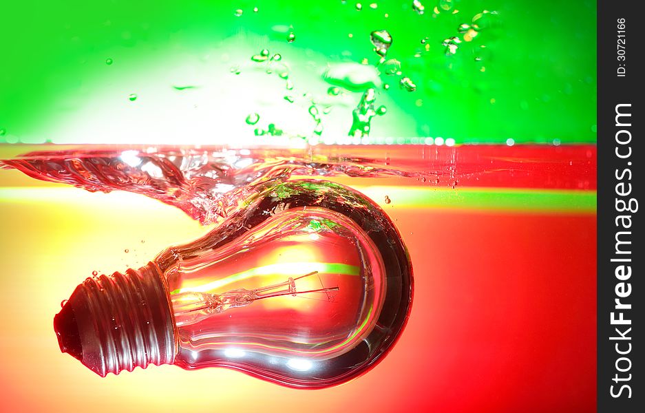Red and green light and lamp deep underwater