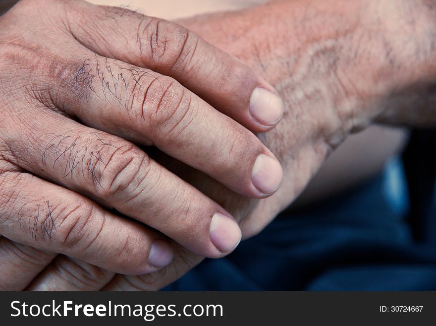 Close up image of old man hand