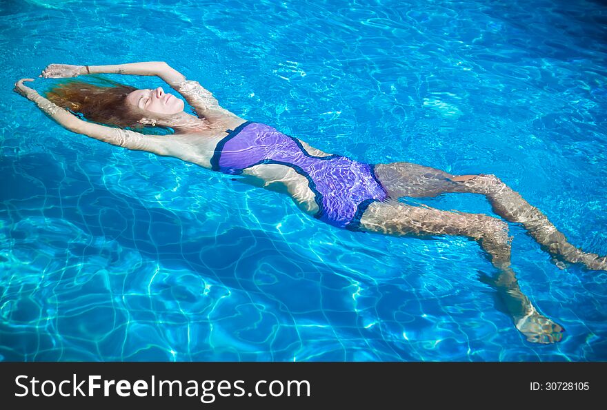 Young woman in the pool. Young woman in the pool