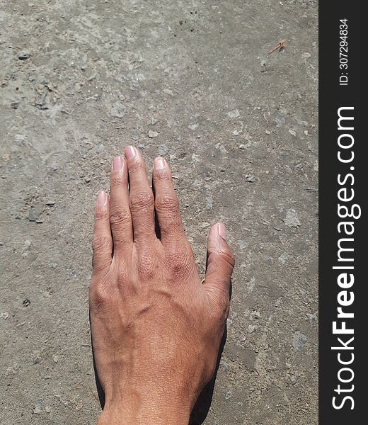 Hand on grey background, nature beauty