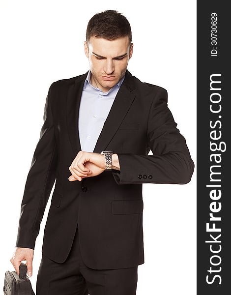 Businessman looking at his watch