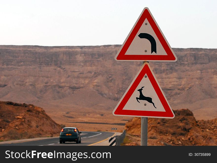 Road signs at Ramon Crater - Makhtesh Ramon in the Negev Desert at the south region of Israel. Road signs at Ramon Crater - Makhtesh Ramon in the Negev Desert at the south region of Israel.