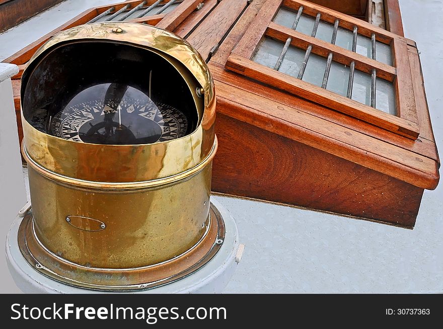 The Nautical Compass on the Deck of an Old Sailing Ship.