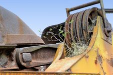 A Plant Growing On An Old Coal Excavator Stock Image