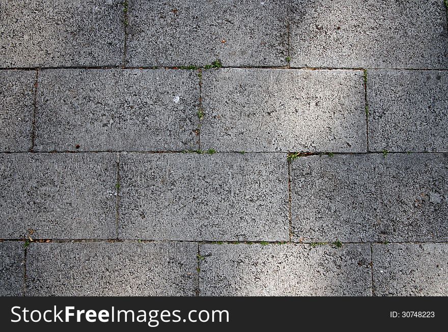 Fragment of a tiled sidewalk
