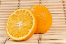 Whole Orange Fruit And His Segments Stock Photography