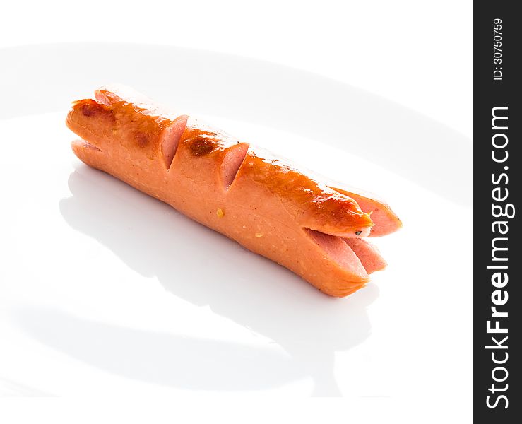 Grilled sausage on white background. Grilled sausage on white background