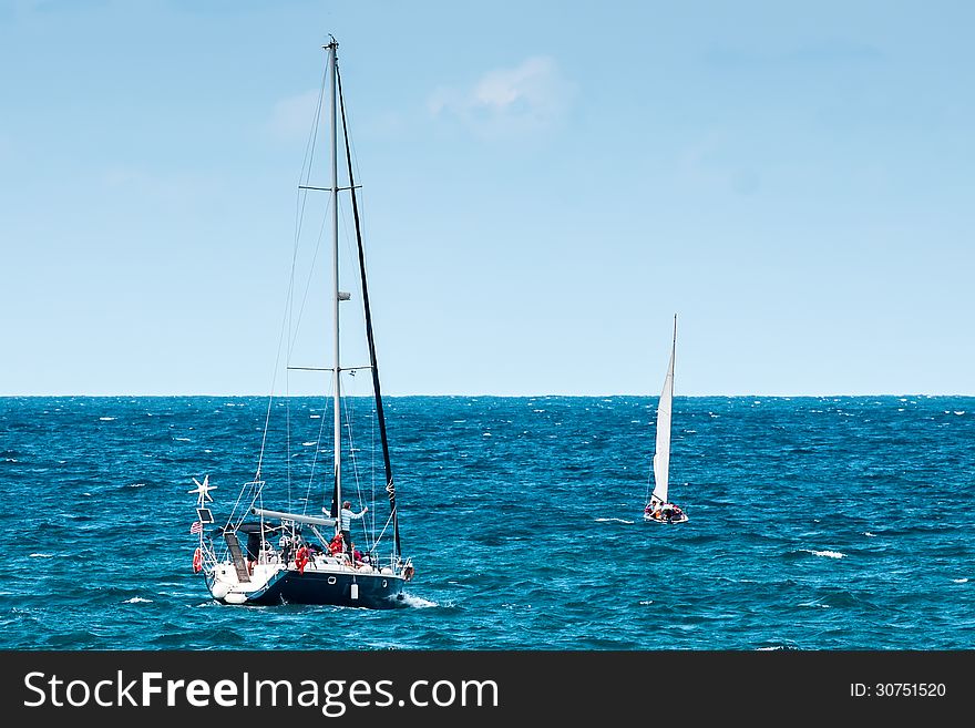 Sailboats sailing in the sea