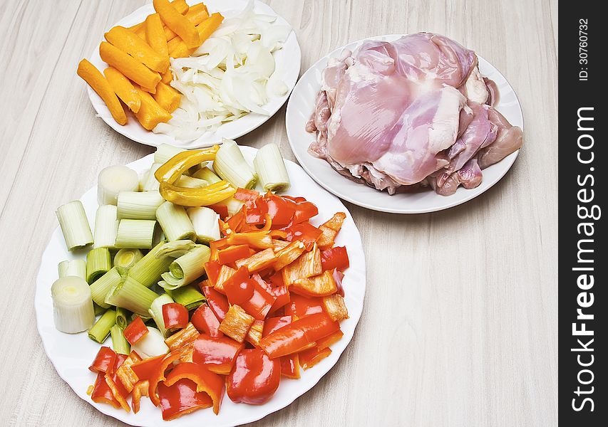Preparation fried chicken fillets with vegetables