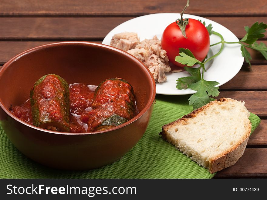 A typical dish of traditional Roman and Italian cuisine made from zucchini, tuna, bread crumbs and tomato sauce. A typical dish of traditional Roman and Italian cuisine made from zucchini, tuna, bread crumbs and tomato sauce