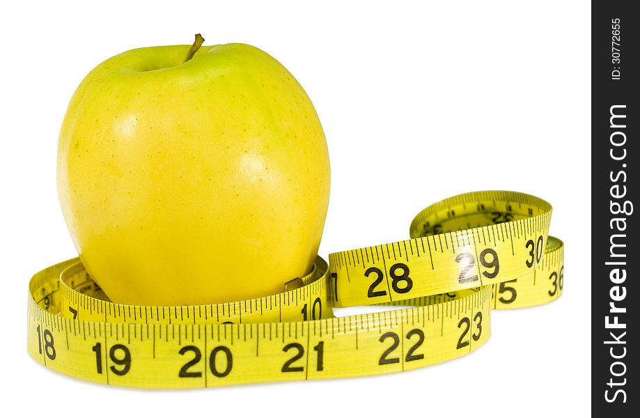 Golden Delicious Apple with a tape measure. Golden Delicious Apple with a tape measure.