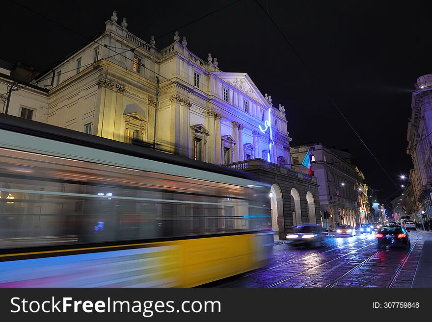 La Scala Theatre And Street Car By Night In Milan City In Italy