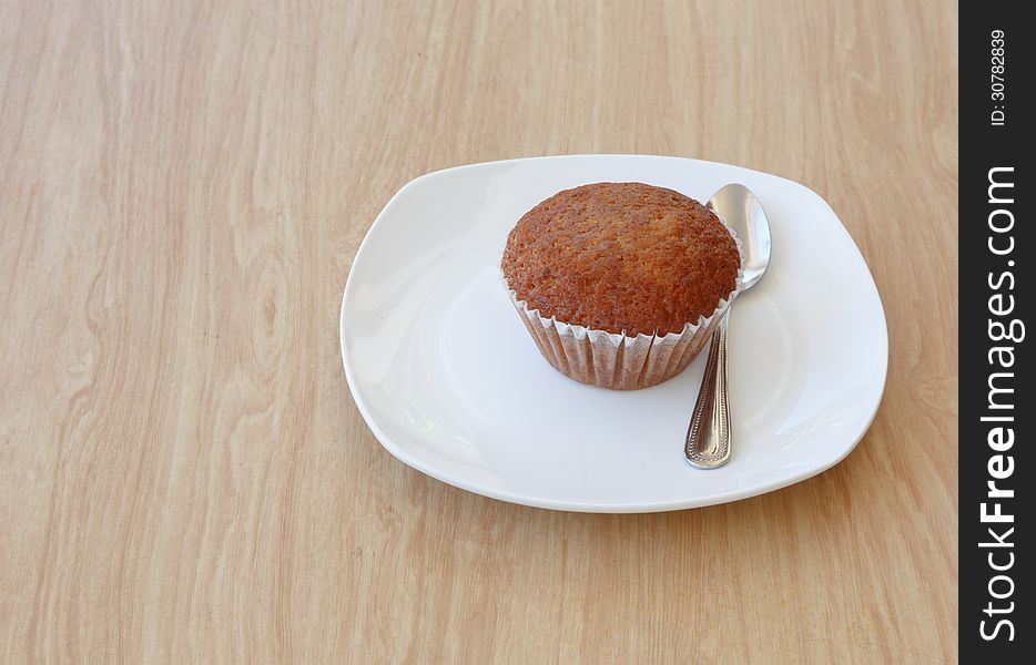 Banana cake on the desk wooden