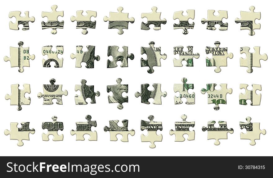 Photo Illustration of a U.S. one hundred dollar bill retouched and re-illustrated as a 32 separate puzzle pieces isolated with a clipping path. Photo Illustration of a U.S. one hundred dollar bill retouched and re-illustrated as a 32 separate puzzle pieces isolated with a clipping path.