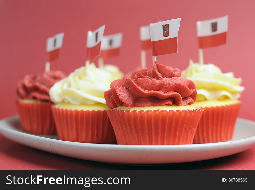 Polish red and white decorated cupcakes - close up wtih bokeh.