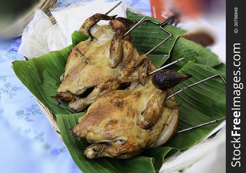 Grilled chicken on a banana leaf