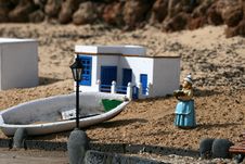 Woman And Fishing Boat Stock Images