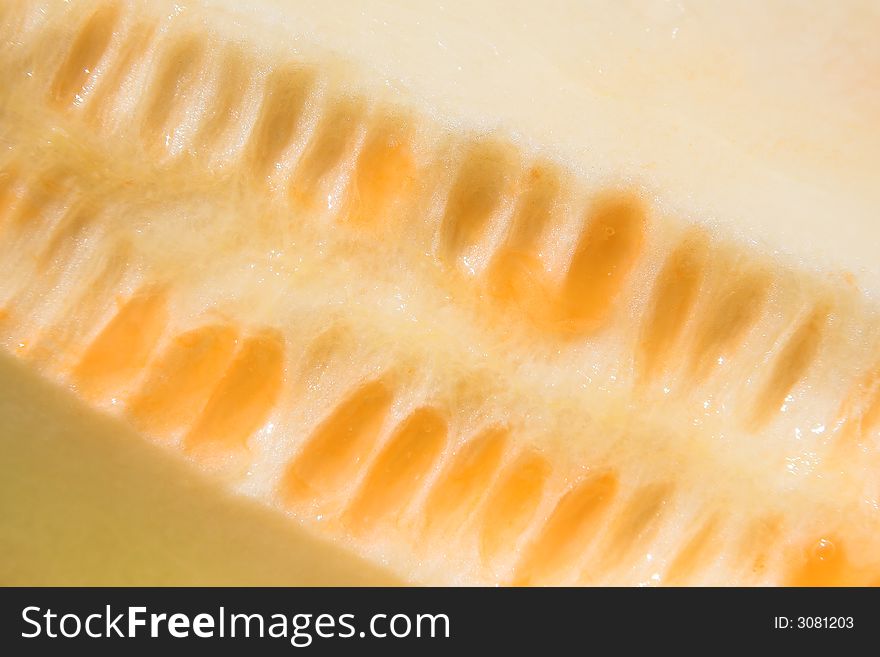 Close-up of a piece of an orange melon. Close-up of a piece of an orange melon.