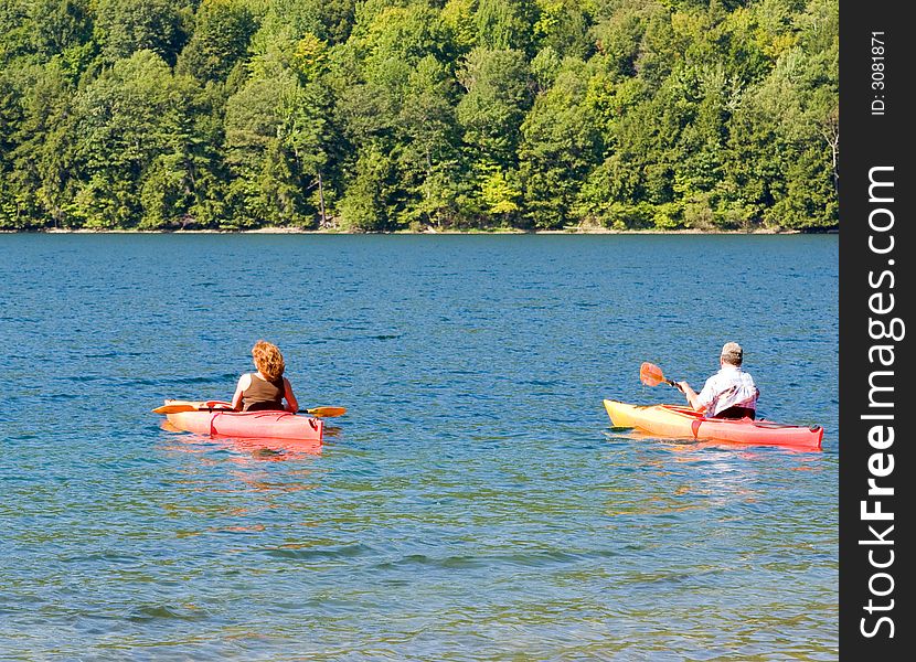 Two Kayakers on Canadice Lake, one of the Finger Lakes in New York State