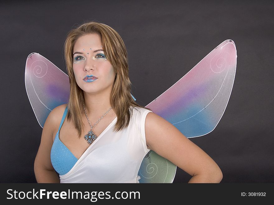 Pretty young woman dressed as fairy. Pretty young woman dressed as fairy