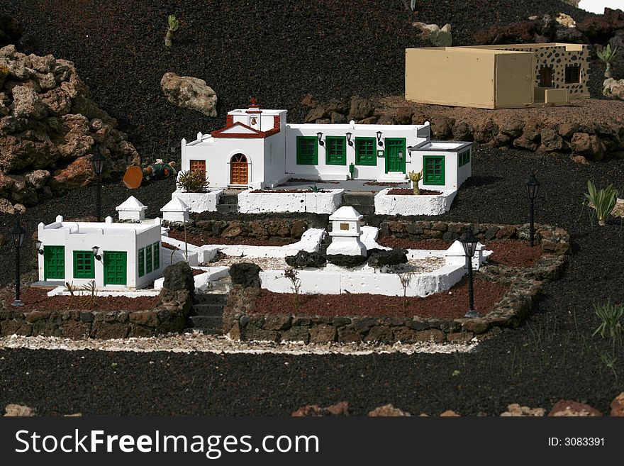 Miniature white spanish hacienda house set up