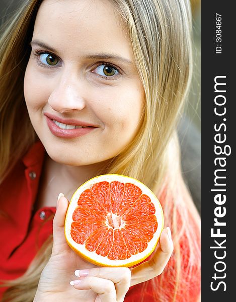 Portrait of woman with fruit