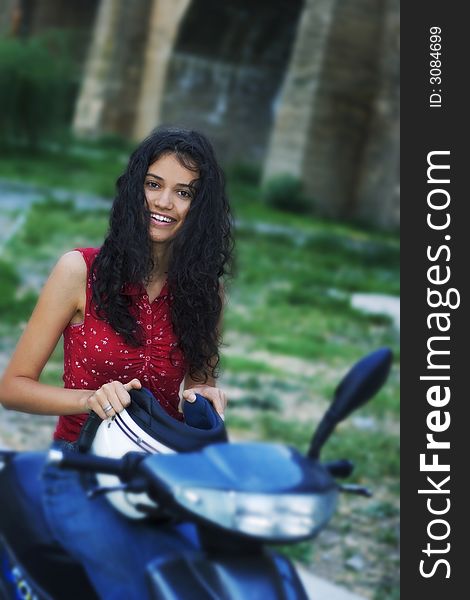 Beautiful young woman on motorcycle. Beautiful young woman on motorcycle