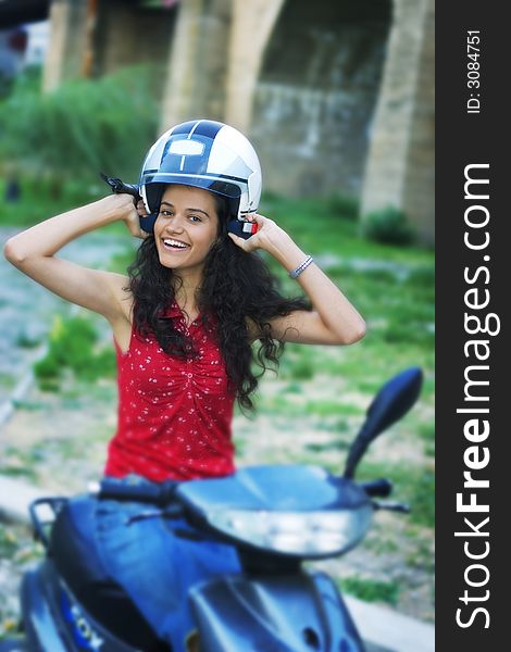 Beautiful young woman on motorcycle. Beautiful young woman on motorcycle