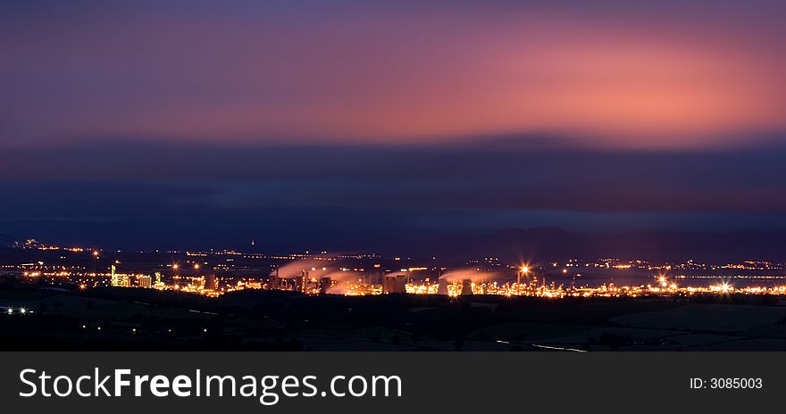 Grangemouth petrochemical plant at dusk, taken from afar. Grangemouth petrochemical plant at dusk, taken from afar.