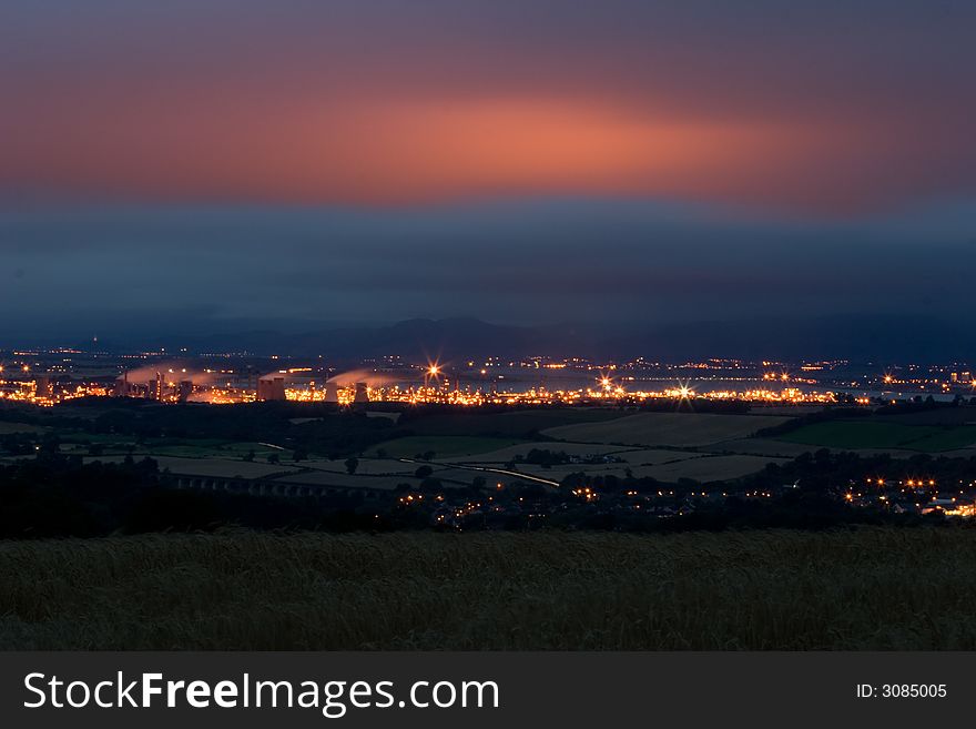 Grangemouth petrochemical plant at dusk, taken from afar. Grangemouth petrochemical plant at dusk, taken from afar.