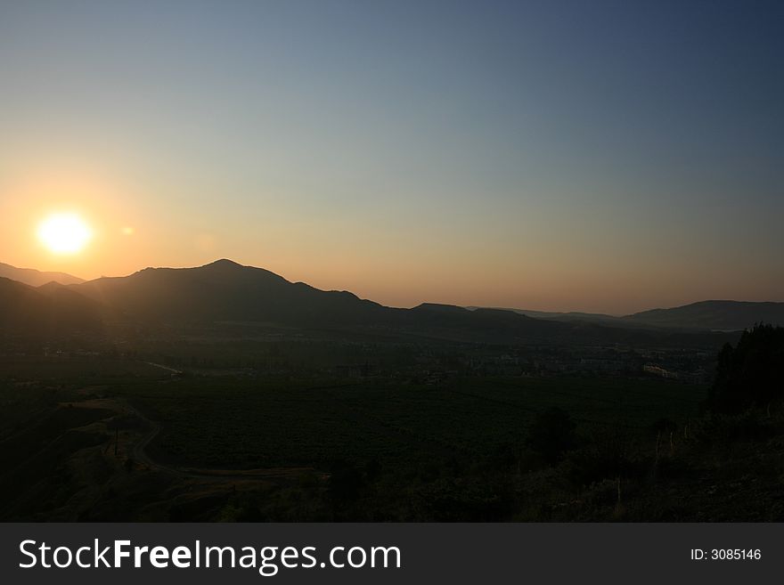 Sunrise is photographed in the mountains. Sunrise is photographed in the mountains