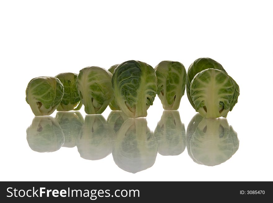 Brussels sprouts isolated over white background. Brussels sprouts isolated over white background