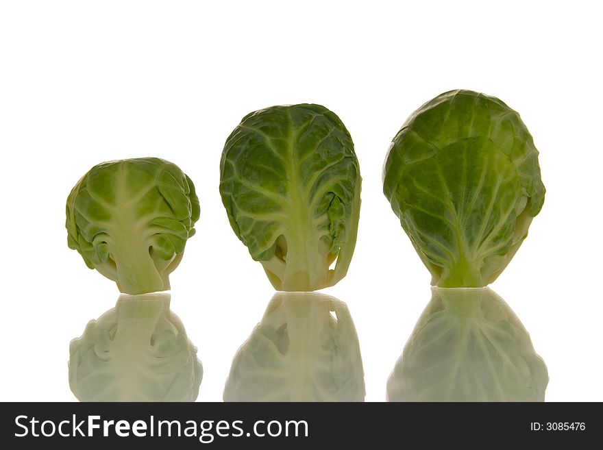 Brussels sprouts isolated over white background. Brussels sprouts isolated over white background