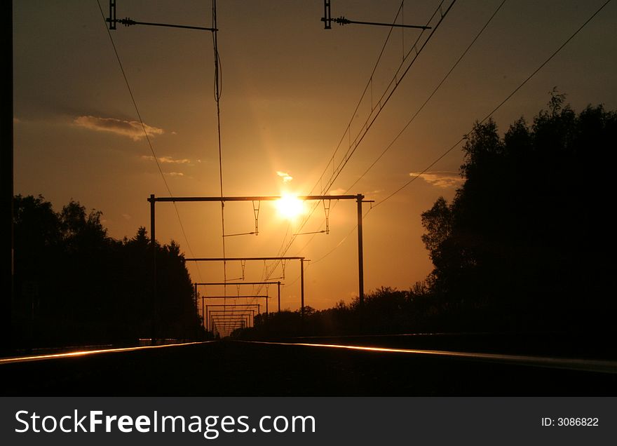 Sunset on the railway, excellent for travelling thoughts, romantic moments, beautiful view. Sunset on the railway, excellent for travelling thoughts, romantic moments, beautiful view