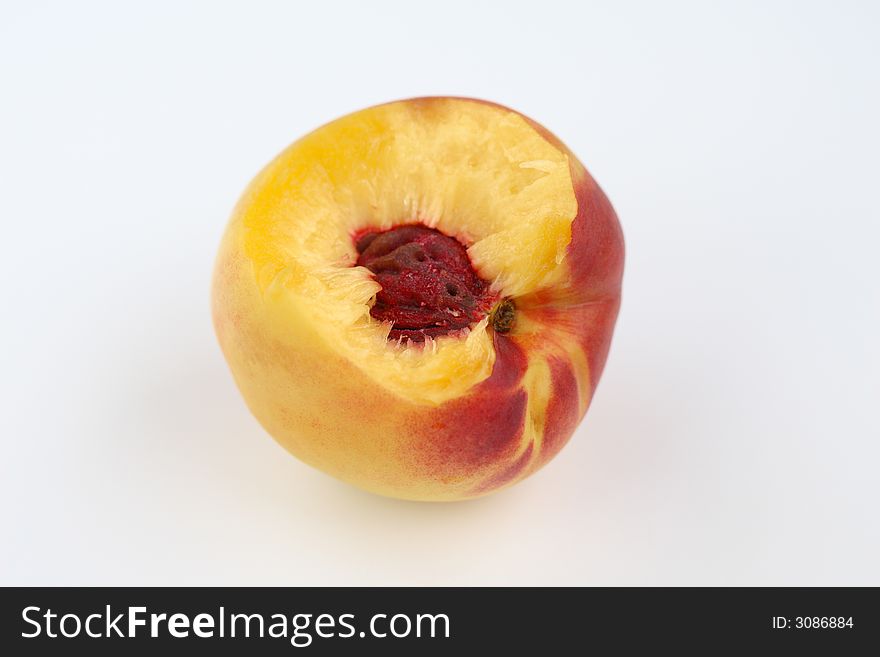 Peach on the white background