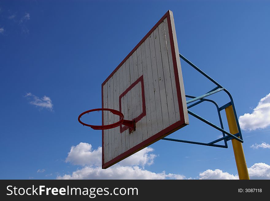 White wooden omnious basketball board