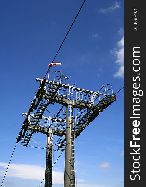 Big concrete chairlift pillars in mountains